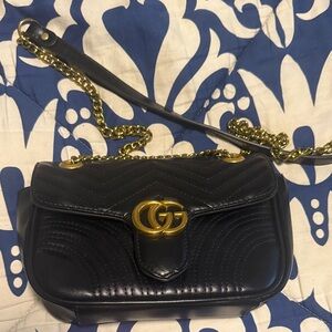 Look like Gucci Luxurious Black Leather Crossbody Bag with Gold Accents